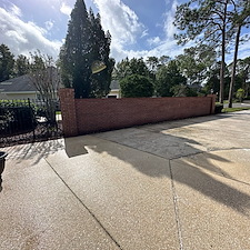 Driveway-Sidewalk-Cleaning-and-House-Wash-Equals-Complete-Exterior-Cleaning-Transformation-at-Deerwood-Country-Club-Jacksonville-FL 2